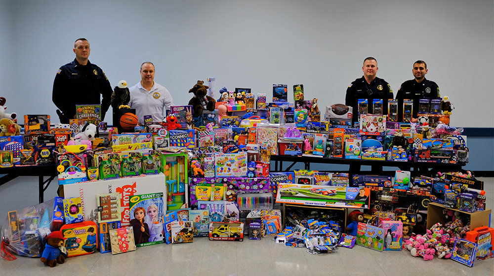 The Lloyd Police Department collected a large number of toys that will be distributed to families in need. Pictured L-R Lt. Phil Roloson, Chief James Janso, Det. Michael Roberto and Officer Nick Vazeos.